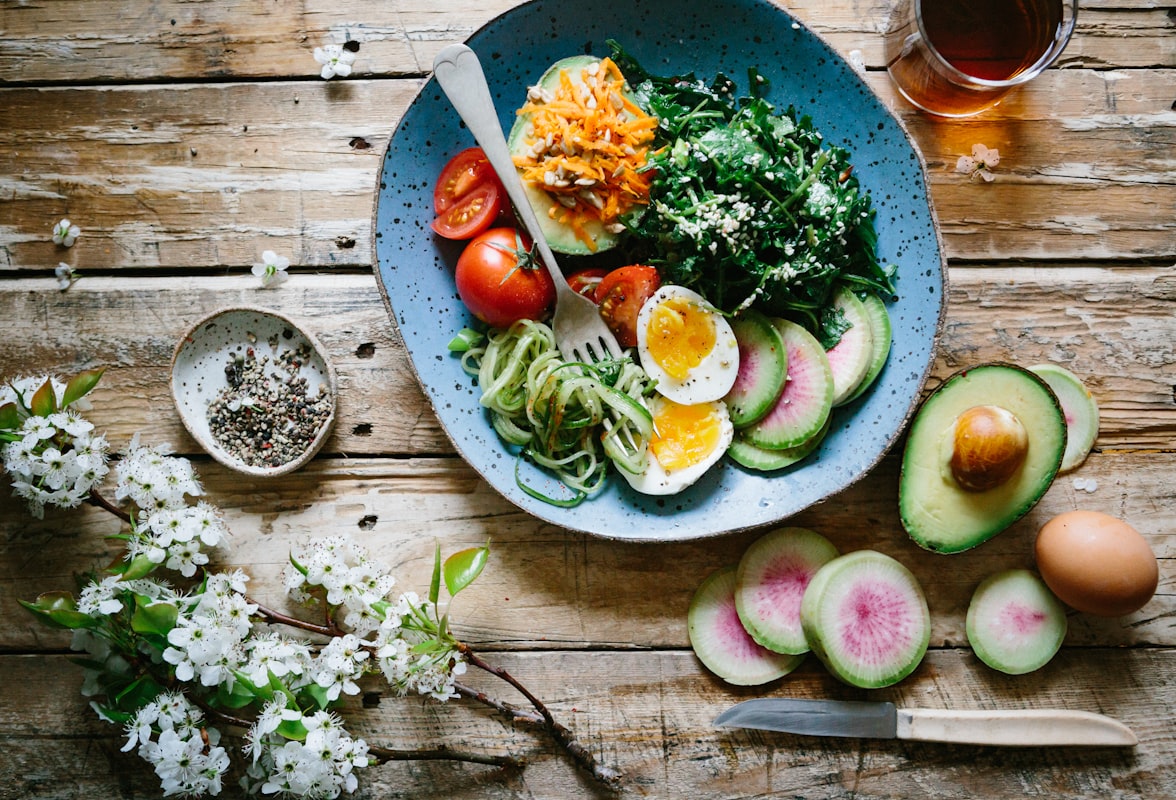 Mediterranean diet spread with olive oil, fish, and fresh herbs